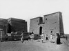 People standing around remains of a pylon and Nubian temple of Dakkeh. Poster Print by Francis Firth - Item # VARBLL0587419601