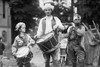 Three Boys March with Instruments on the 4th of July Celebration; Dressed in colonial garb as the Spirit of 76 Poster Print - Item # VARBLL058746231L