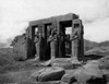 The Memnonium.  Four headless statues standing before colonnade.  Luxor is a city in Upper Egypt and the capital of Luxor Governorate and the site of the Ancient Egyptian city of Thebes Poster Print by Francis Firth - Item # VARBLL0587419466