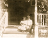 Two African American children sitting on steps to porch Poster Print - Item # VARBLL0587635339