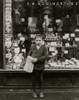 Simon Mellitto, 314 American St., age 10, newsboy, income 25 to 75 cents per day. Father a locksmith, making about $12 per week. Has a brother who sells also.  Poses in front of Woolworth store Poster Print - Item # VARBLL058754732L