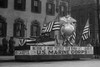 US Marine Corps Parade Float emphasizing recruitment; equipped with two machine guns facing forward and a large globe and anchor topped with an eagle - stacked rifles on rear Poster Print - Item # VARBLL058746246L