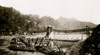 Chinese built suspension bridge, boats docked at pier in foreground, Szechwan Province, China Poster Print - Item # VARBLL058751983L