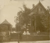 African American family posed on porch of house Poster Print - Item # VARBLL0587632445