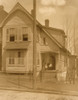 African American family posed on porch of house Poster Print - Item # VARBLL0587632437