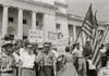 people holding signs and American flags protesting the admission of the "Little Rock Nine" to Central High School. Poster Print - Item # VARBLL0587633352