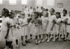 African American and white school girls standing in a classroom while boys sit behind them. Poster Print by Thomas J. O'Halloran - Item # VARBLL058763331x