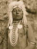 Crow Indian, half-length portrait, facing front, wearing headdress and several necklaces. Poster Print - Item # VARBLL058746976L