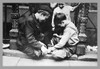 Immigrant children enjoying the activity of building a house from playing cards. Poster Print by unknown - Item # VARBLL0587025654
