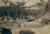 Bird's-eye view of a train on tracks, just beyond a marked curve. On Burlington and Missouri River Railway. Buckhorn Mountains in background.  Photograph by John C.H. Grabill in 1890. Poster Print by John C.H. Grabill - Item # VARBLL0587238003