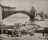 view of the St. Louis Bridge under construction, spanning the Mississippi River. Poster Print - Item # VARBLL058751985L