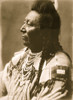 Plenty Coups, Crow Indian, head-and-shoulders portrait, facing left, pompadour, temple braids, beaded buckskin shirt, shell beads around neck Poster Print - Item # VARBLL058747558L