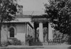 Photograph shows armed Union soldiers standing outside the portico of Arlington House, the former residence of Confederate General Robert E. Lee.  June 29th 1864. Poster Print by Andrew J. Russell - Item # VARBLL0587420766