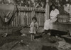 Alma Crosien, three-year-old daughter of Mrs. CoRa Croslen, of Baltimore. Both work in the Barataria Canning Company. The mother said, "I'm learnin' her the trade." Poster Print - Item # VARBLL058755104L