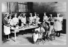 Young immigrant children taking a class in home economics, i.e. cooking and other domestic roles. Poster Print by unknown - Item # VARBLL0587025719