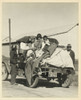 North to California, migrant works stack their cars with children and life's possessions to work the farm crops of fertile valleys. Poster Print - Item # VARBLL058746431L