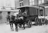 Horse-drawn wagon outside Bureau of Engraving and Printing building; 2 White wagon drivers and 3 African American Loaders Poster Print - Item # VARBLL058746676L