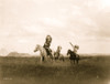 Three Sioux Indians on horseback on plains with rock formations in background. Poster Print - Item # VARBLL058746987L