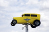 Yellow vintage car sits atop a large pole advertising the Auto Museum in Santa Rosa, New Mexico Poster Print - Item # VARBLL058748569L