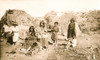 A group of Apache Indians in front of their thatched huts. Poster Print - Item # VARBLL058751263L