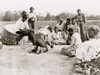 African Americans resting and shooting dice at edge of cotton field Poster Print - Item # VARBLL0587634812