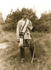 Os Ko Bos, an Osage Indian, standing, full-length, facing front, holding bow and arrows. Poster Print - Item # VARBLL058751215L