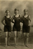 Three young women posing in swimsuits and wearing their swimming competition medals Poster Print - Item # VARBLL058750091L