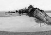 A wrecked German submarine at Calais used to try to break the British naval blockade of Germany. Poster Print by unknown - Item # VARBLL0587036966