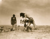 Navajo man impersonating Yebichai, placing feather sticks around the sweat. Poster Print - Item # VARBLL058747474L