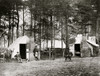 Capt. J.R. Coxe, Capt. Harry P. Clinton and two other men posed in camp. Poster Print - Item # VARBLL058753594L