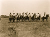 Several Cheyenne chiefs on horseback in a row in an open field. Poster Print - Item # VARBLL058747720L