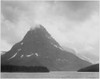 High lone mountain peak lake in foreground "Two Medicine Lake. Glacier National Park" Montana. 1933 - 1942 Poster Print by Ansel Adams - Item # VARBLL0587400412