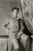 African American boy, three-quarter-length portrait, half-sitting on table, facing front Poster Print - Item # VARBLL0587634464