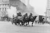 A Team of Horses pulls a stem pumper across paved streets toward a fire scene. Poster Print by unknown - Item # VARBLL058745950L
