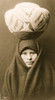 Head-and-shoulders portrait of Zuni girl with pottery jar on her head. Poster Print - Item # VARBLL058746891L