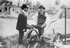J.F. Jacobson, with farmer and farming machine in yard Poster Print - Item # VARBLL058756540L