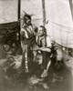 Siksika man with calumet and young boy inside tipi. Poster Print - Item # VARBLL058751268L