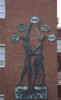 Bronze statues with two youths holding up an equal sign surrounded by educational symbols of curricula Poster Print - Item # VARBLL058759382L