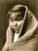 Head-and-shoulders portrait of Navajo Indian child, facing front, blanket around back of head and shoulders. Poster Print - Item # VARBLL058747446L