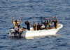 Seven Suspected Pirates With Hands Raised On Orders Of A U.S. Naval Counter-Piracy Search And Seizure Team In The Gulf Of Aden. Feb. 11 2009. History - Item # VAREVCHISL024EC238