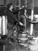 A 'Brewmeister' Fills Kegs At A Bootleg Brewery During Prohibition History - Item # VAREVCHBDPROHCS001