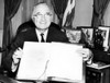 President Harry Truman Holds Up The Japanese Peace Treaty He Signed Into Ratification History - Item # VAREVCPBDHATRCS001