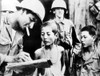 Korea War Captured North Korean Boys Being Questioned By U.S. Soldier History - Item # VAREVCSSDKOWACS008