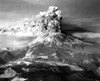 Mount St. Helens In Eruption On May 18 1980. In The Background Is Another Cascade Volcano Mt. Adams. History - Item # VAREVCHISL030EC085