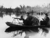 Viet Cong Guerrillas In Small Boats Patrol The Saigon River In South Vietnam In Photo Taken By Communist Forces. History - Item # VAREVCHISL014EC182