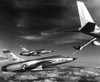 Fighters Refuel Over Vietnam. Us Air Force F-105 Thunderchiefs Refuel Before Their Bombing Mission In Vietnam. Jan. 1966. History - Item # VAREVCHISL033EC520