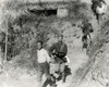Chinese Communist Soldiers Are Taken From A Tower Captured By Government Forces. The Fighting Took Place Along The Border Of Kiangsi And Fukien Provinces In January 1934. - History - Item # VAREVCHISL038EC706