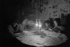 African American Children Reading By Kerosene Lantern Light At A Diner Table History - Item # VAREVCHISL035EC765