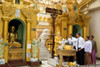 President Barack Obama Pours Water Over The Left Shoulder Of The Friday Buddha. He Was Touring The Shwedagon Pagoda In Yangon History - Item # VAREVCHISL039EC670