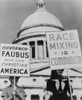 A Mother And Her Son Hold Signs Equating School Integration With Communism And Segregation With Christianity. At The Arkansas State Capitol In Little Rock. 1959. History - Item # VAREVCHISL033EC784